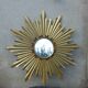 Gold metal sun mirror