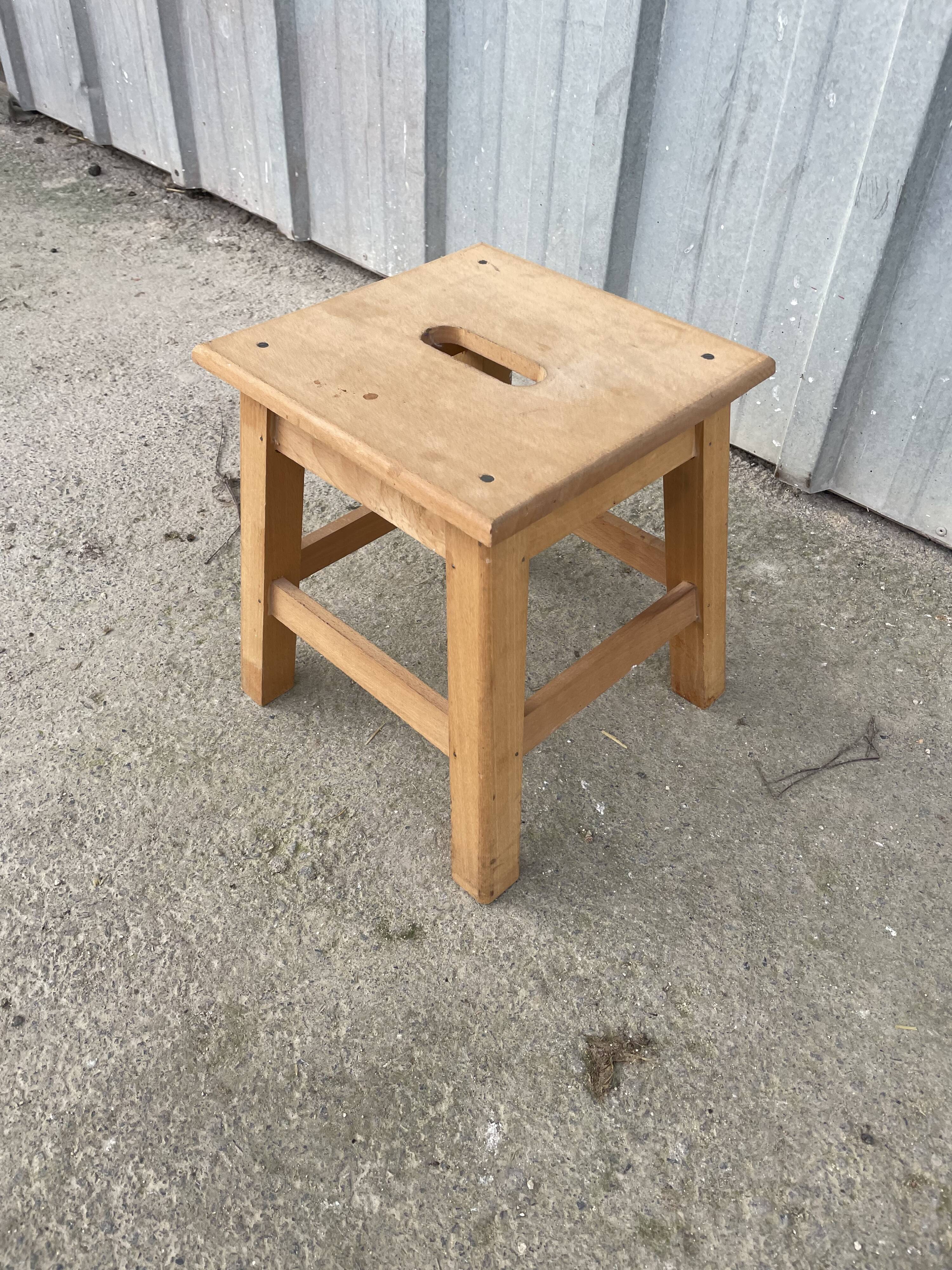 Small low wooden stool