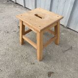 Small low wooden stool