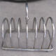 SILVER METAL TOAST DISPENSER WITH RING HANDLE