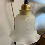 Two portable lamps with wall mount.