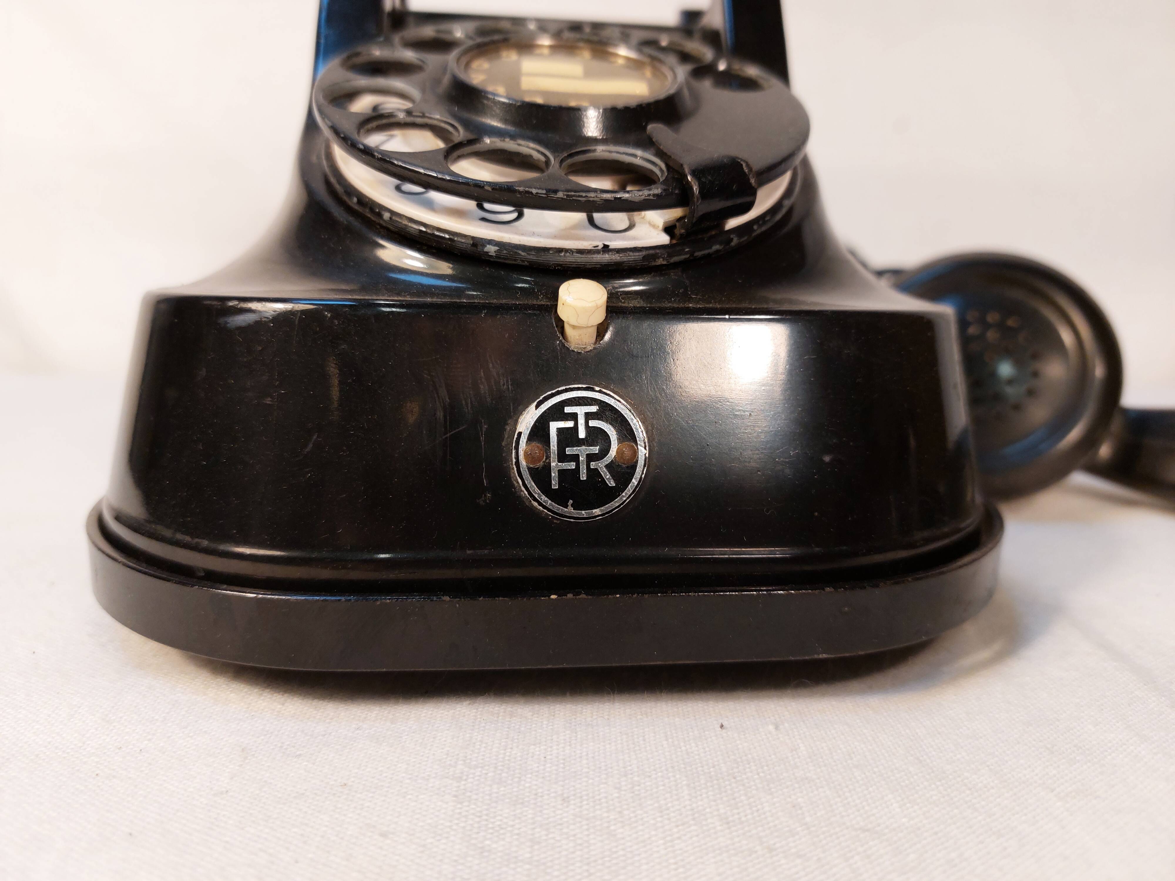 Old Belgian RTT 56B dial telephone in black bakelite