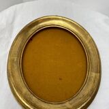 Old oval shaped wooden frame