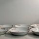 Porcelain deep plates with floral decoration