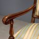 Antique Baroque-style walnut armchair, upholstered, 19th century.
