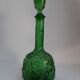Empoli green glass bottle, zodiac signs
