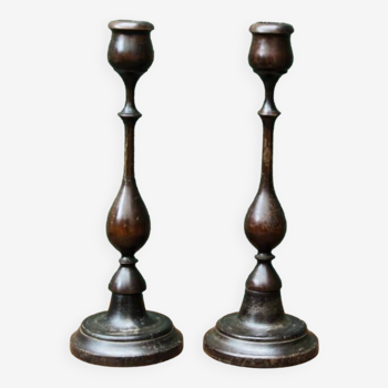 Pair of turned wooden candlesticks
