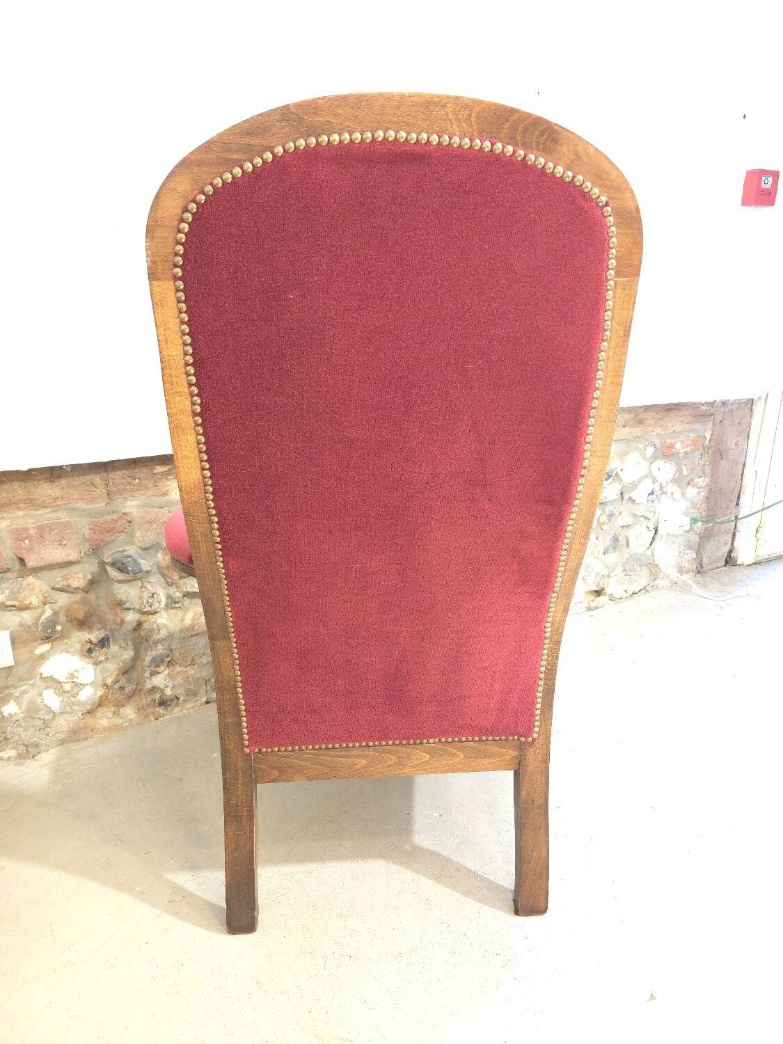 Voltaire red velvet armchair