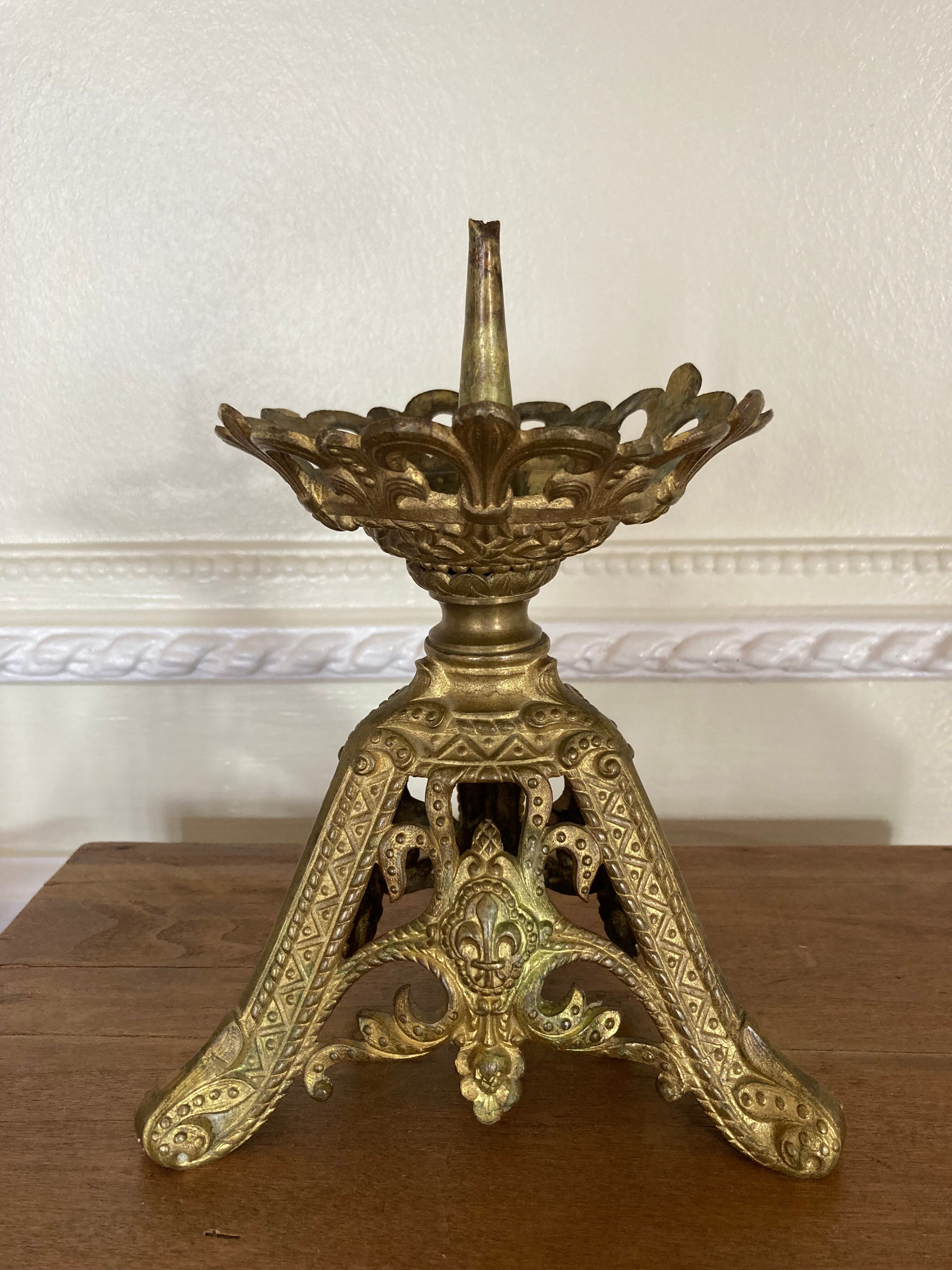Candle holder church in gilded metal