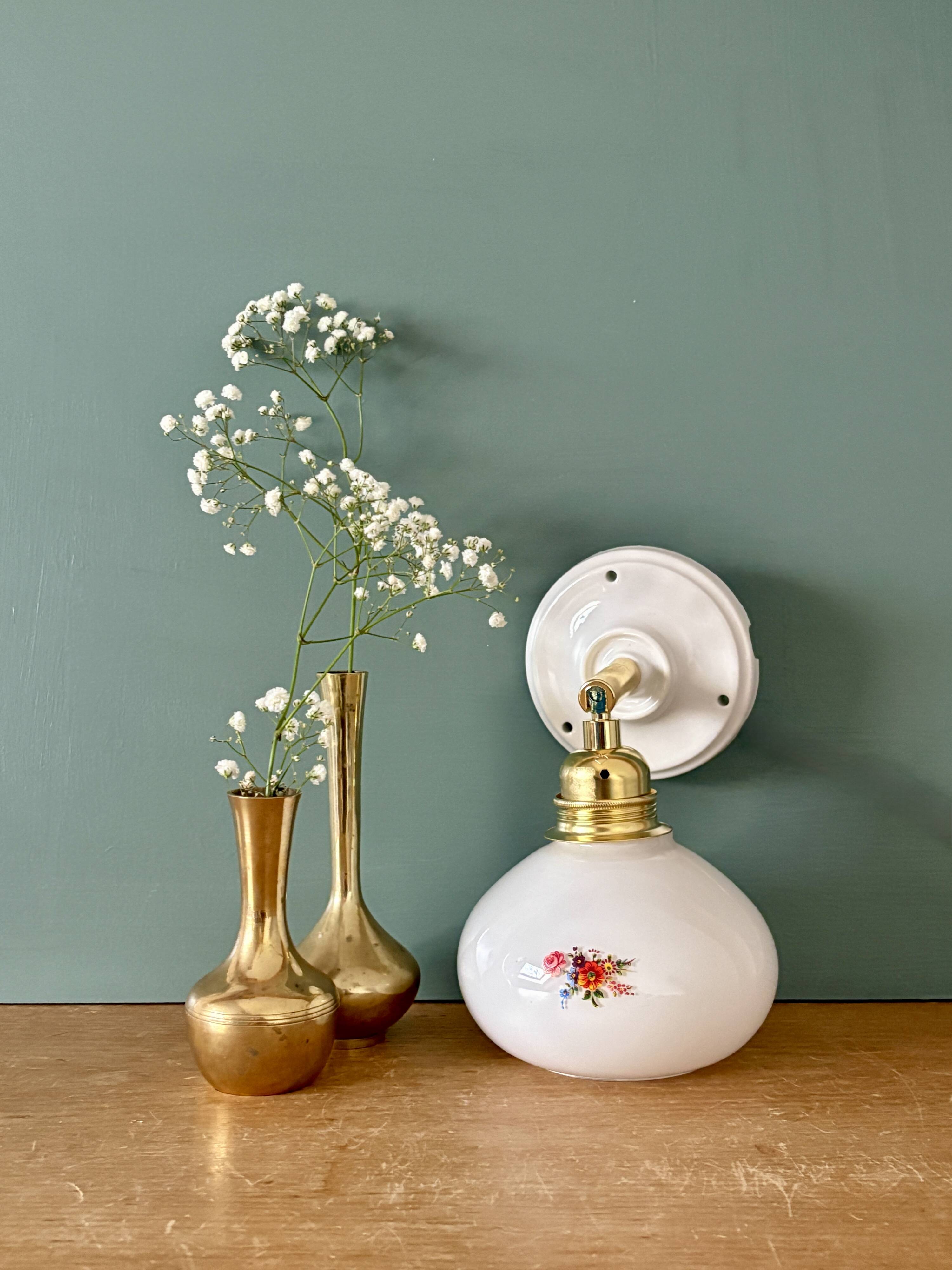Vintage globe wall sconce in white opaline glass with floral decorations