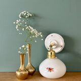 Vintage globe wall sconce in white opaline glass with floral decorations