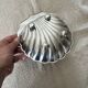 vintage shell-shaped bowl / empty pocket in metal (stainless steel)