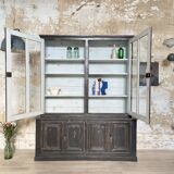 Display cabinet in patinated wood