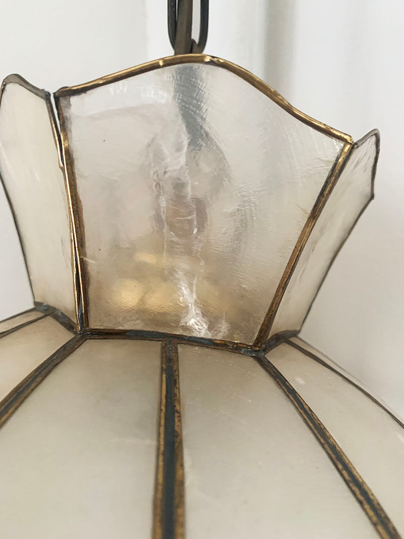 Mother-of-pearl and brass suspension