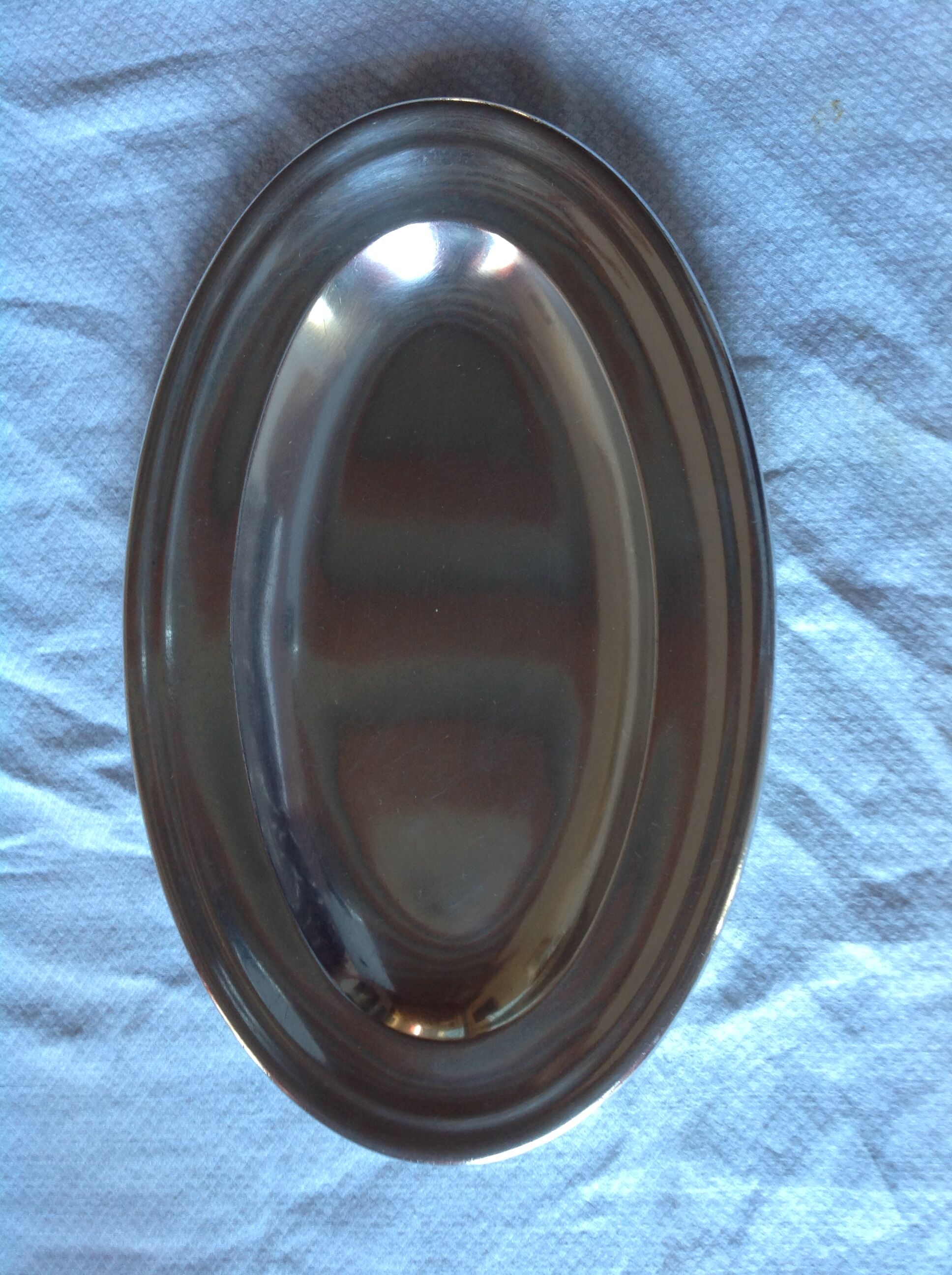 Old oval dish in silver metal