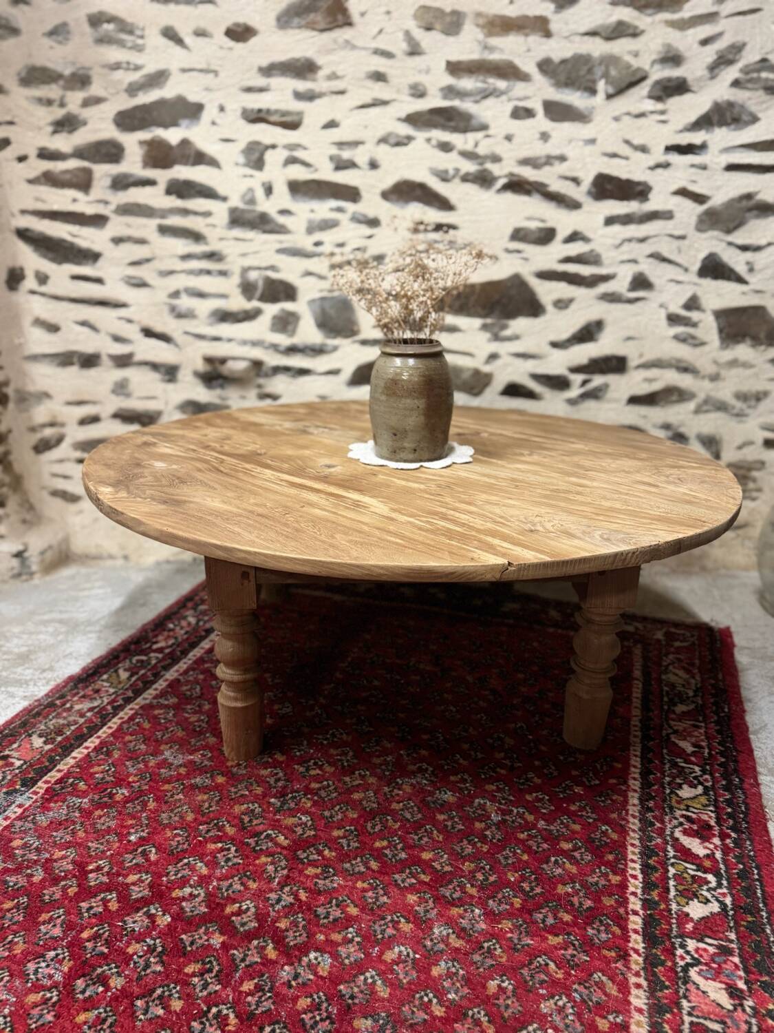 Oval coffee table in raw wood