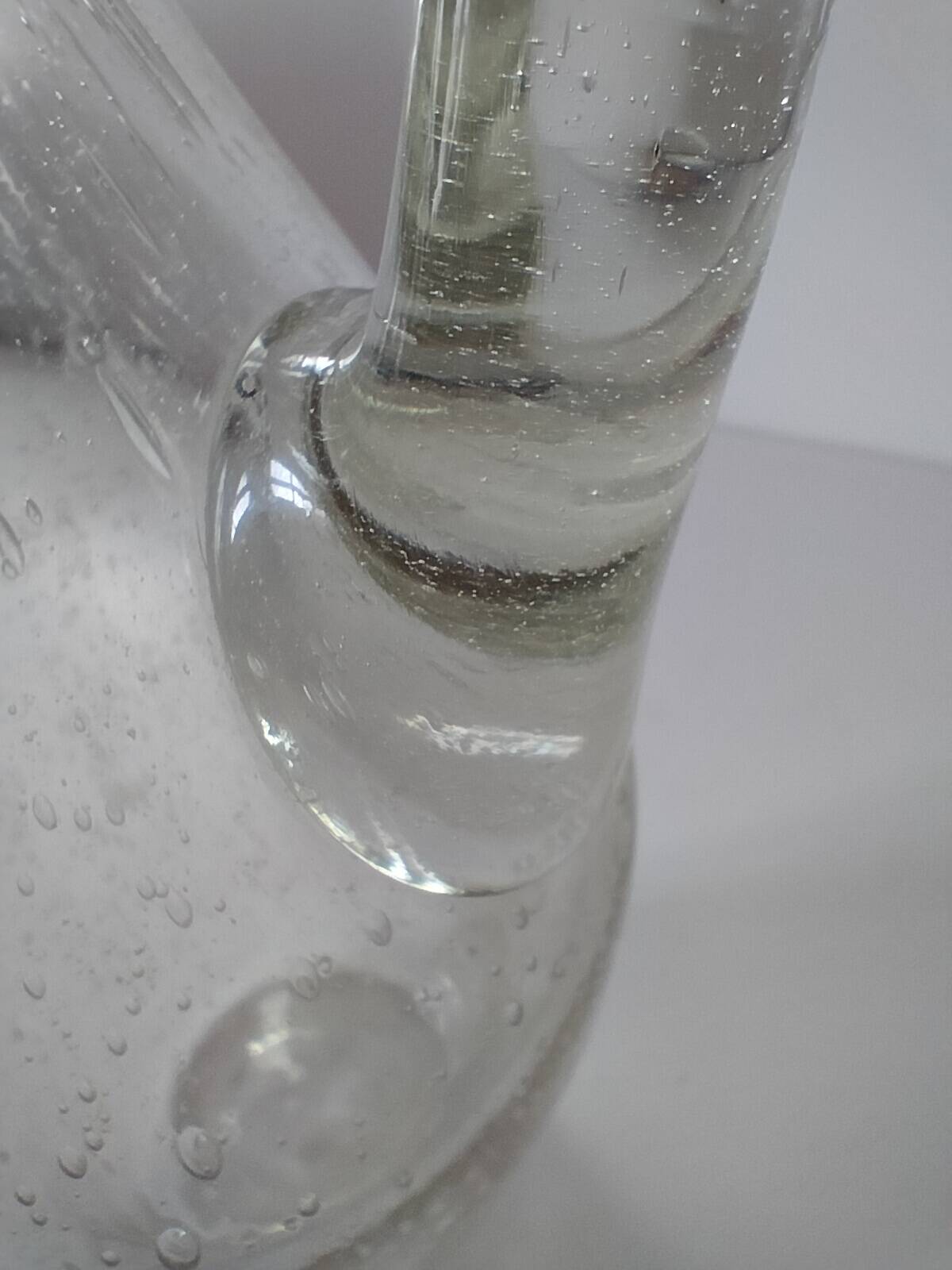 Bubble glass carafe bottle signed Biot in lime green colour.