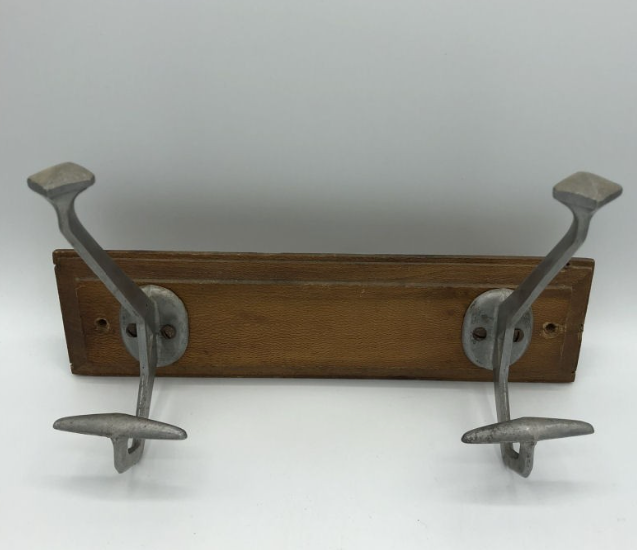 Wall coat rack with 2 hooks on wood