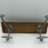 Wall coat rack with 2 hooks on wood