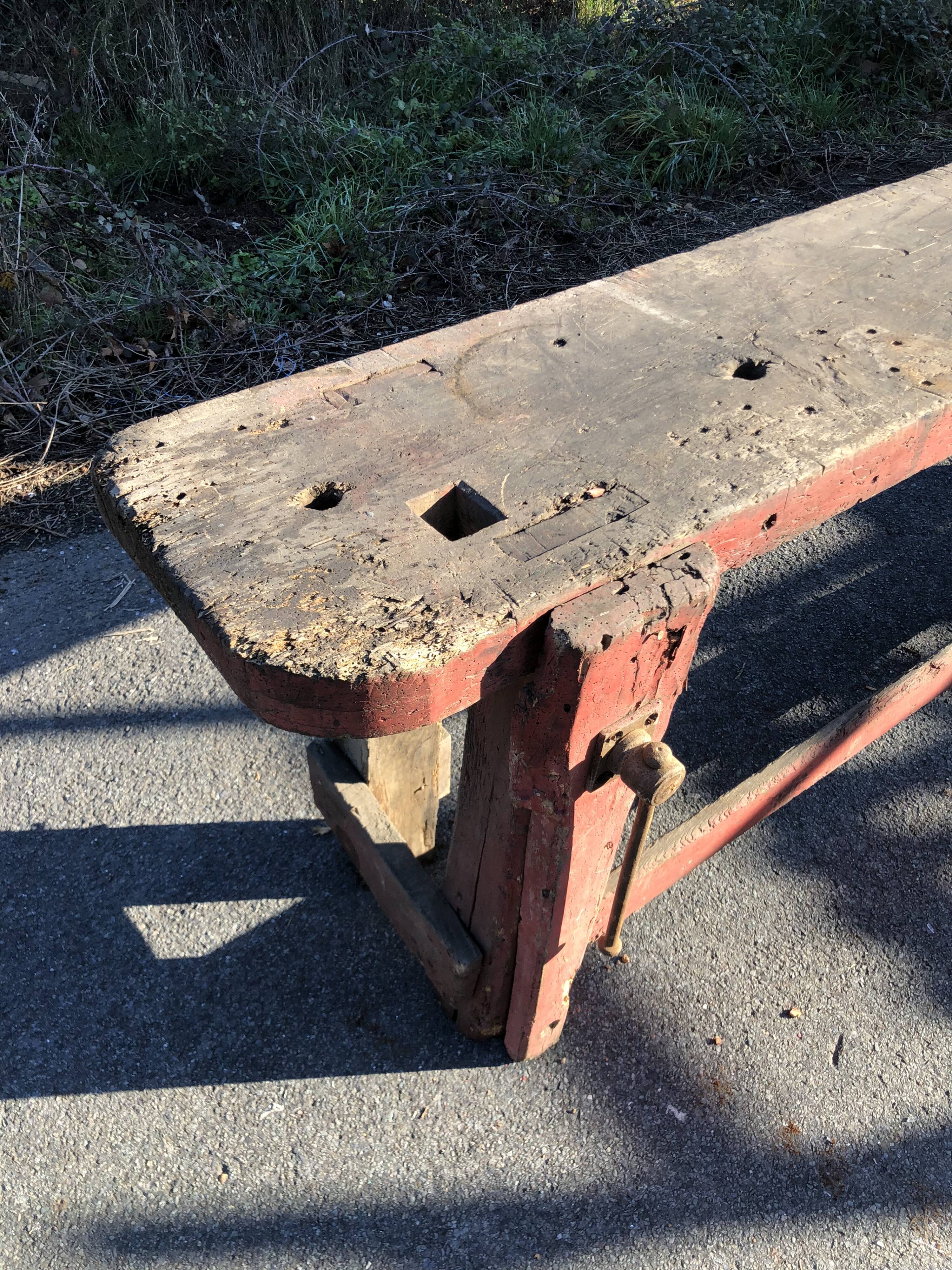 Old carpenter's workbench painted red