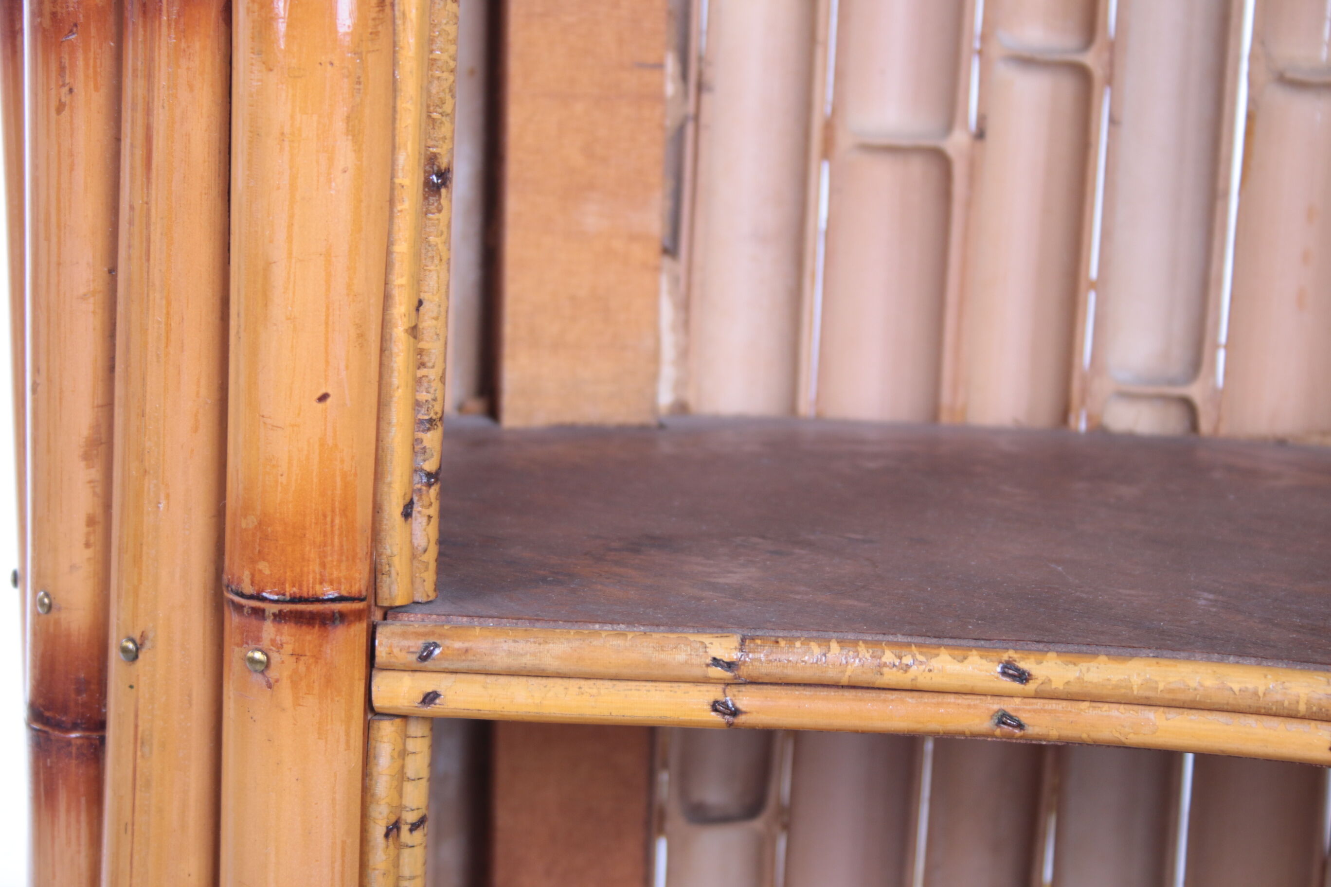 Vintage bamboo Tiki bar cocktail bar with 2 bar stools.