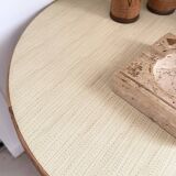 Vintage round tripod side table in rattan