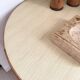 Vintage round tripod side table in rattan