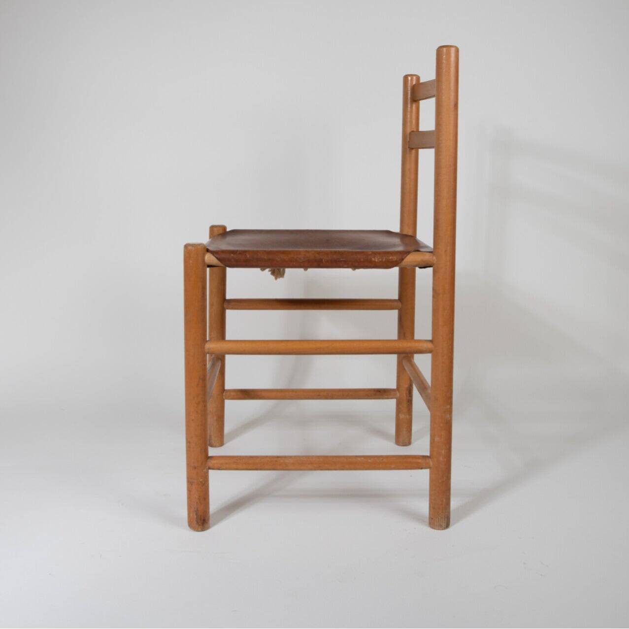70s dining chair by Ate van Apeldoorn in pine and saddle leather