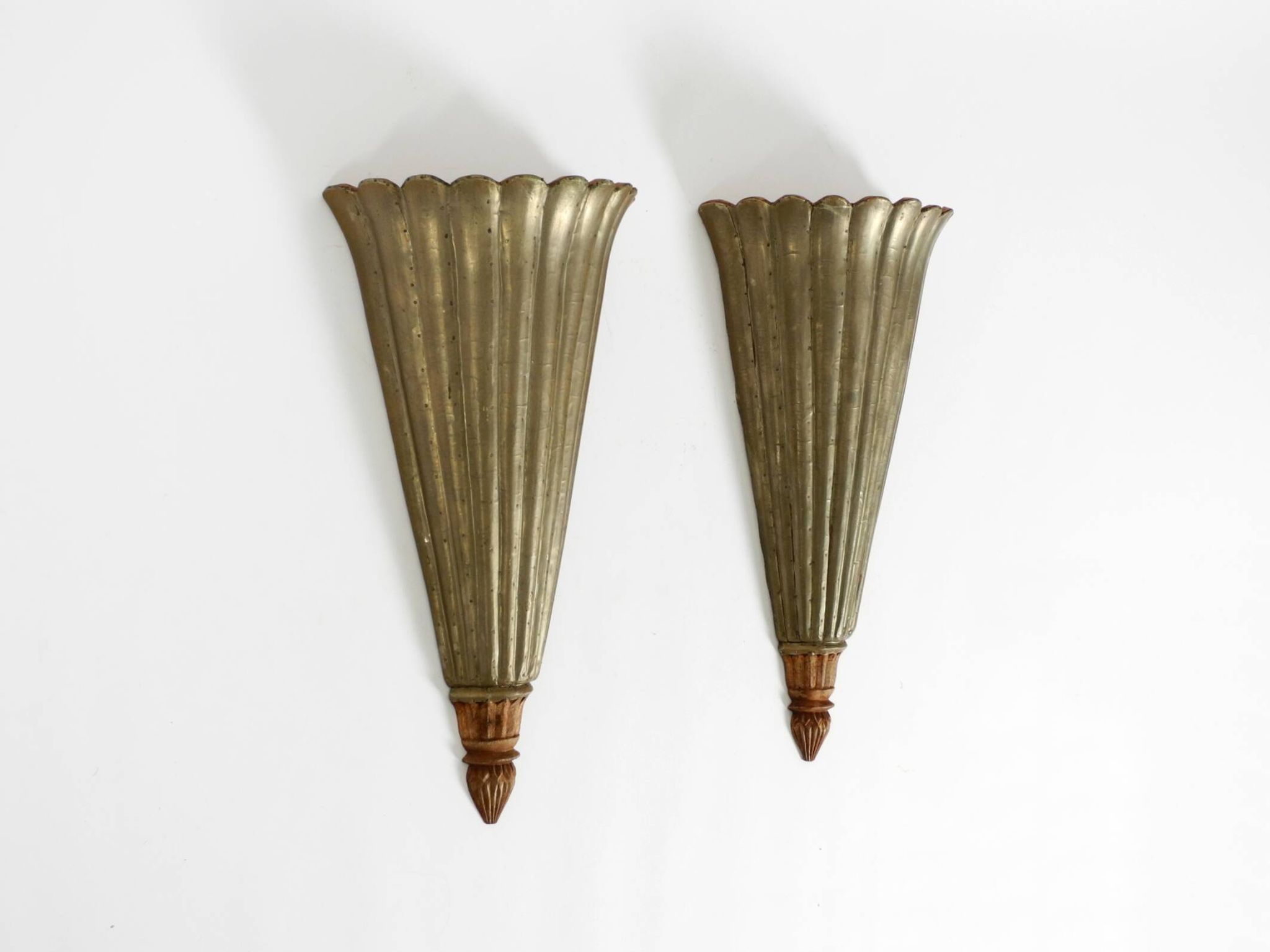 Two large, rare 1950s wall lamps made of wood with aluminum cladding