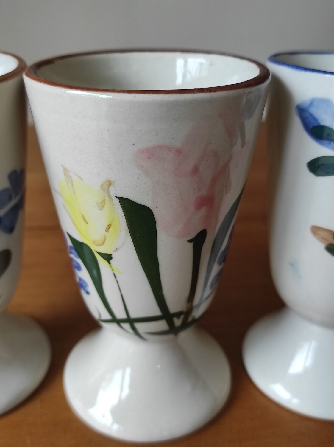 Set of 3 hand-painted Chinese ceramic Mazagrans with floral decoration.