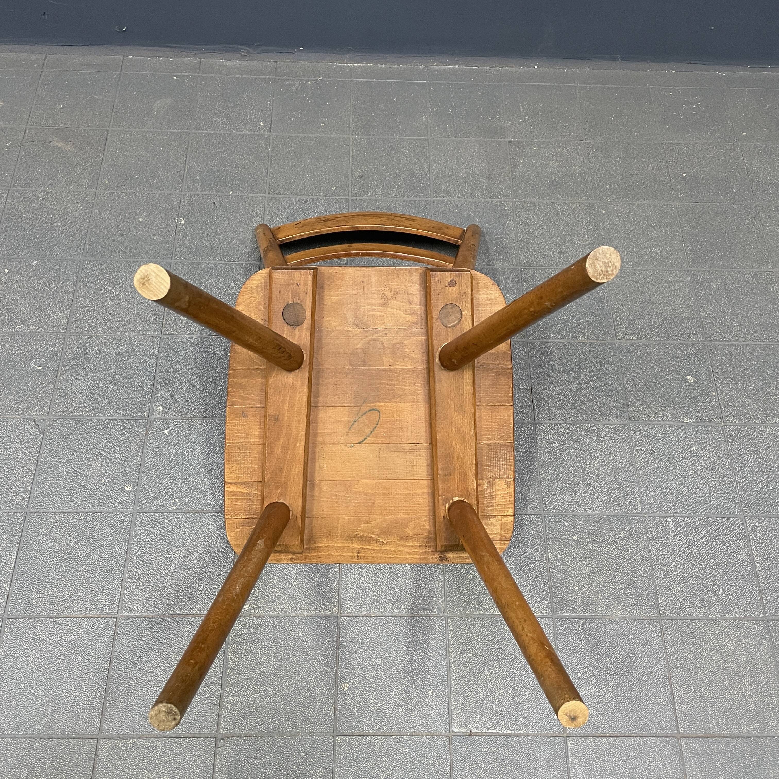 Set of eight german stick chairs from the 1950