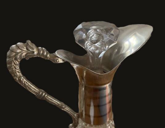 Diamond-point molded glass ewer, silver-plated metal.
