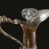 Diamond-point molded glass ewer, silver-plated metal.