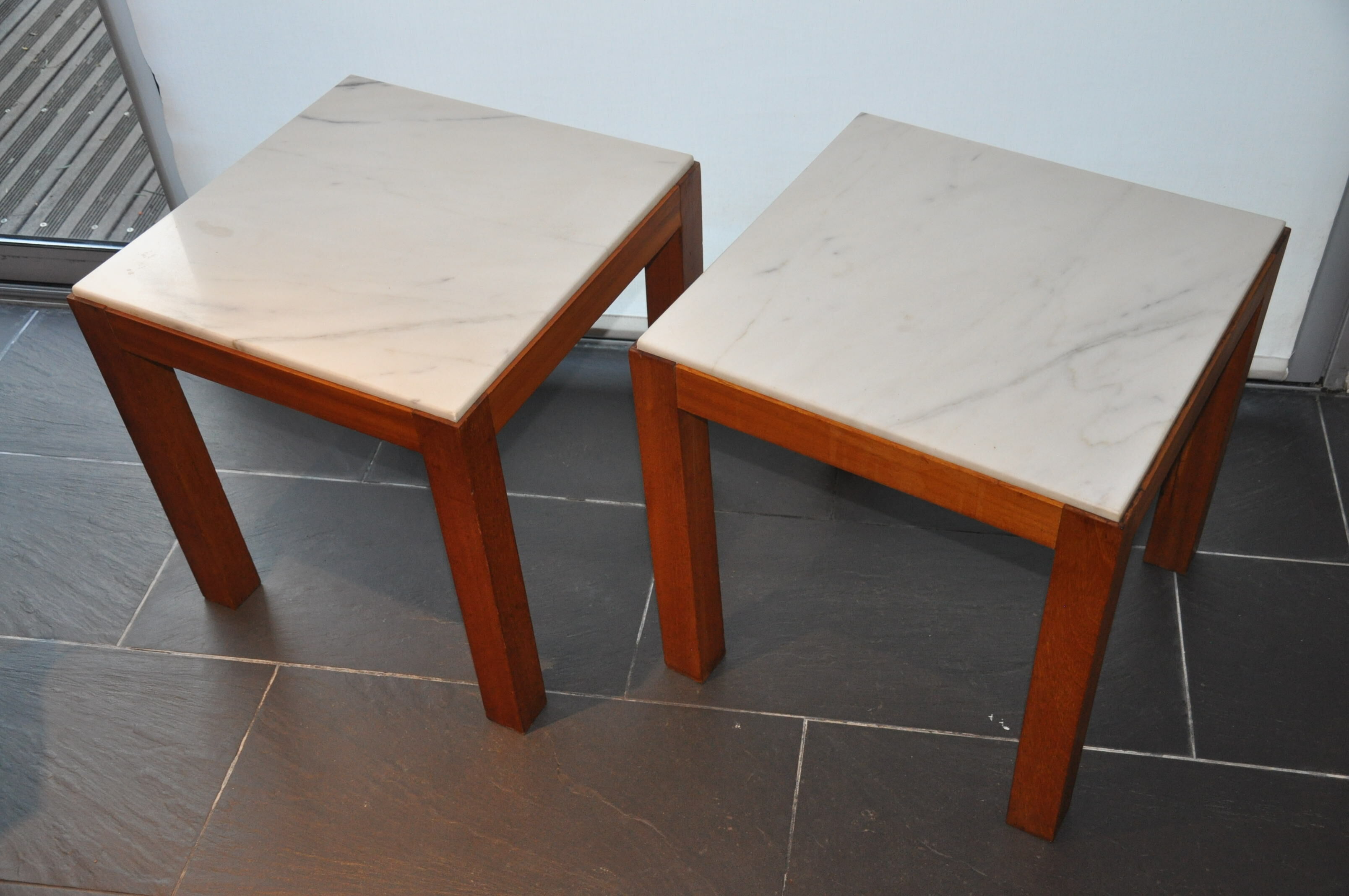Pair of wooden and marble side tables