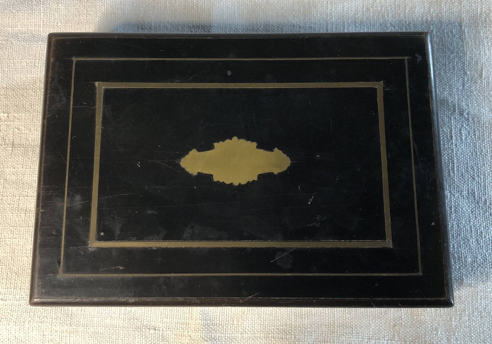 Vermeil (gilded silver) spoons in black wooden box
