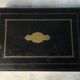 Vermeil (gilded silver) spoons in black wooden box