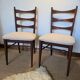 Pair of vintage wood and corduroy chairs