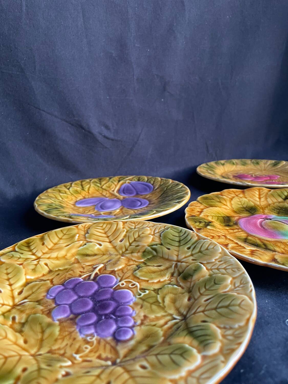 Set of four old Sarreguemines barbotine plates