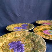 Together, four antique Sarreguemines barbotine plates.