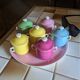 6 small porcelain cream pots from Limoges with a tray.