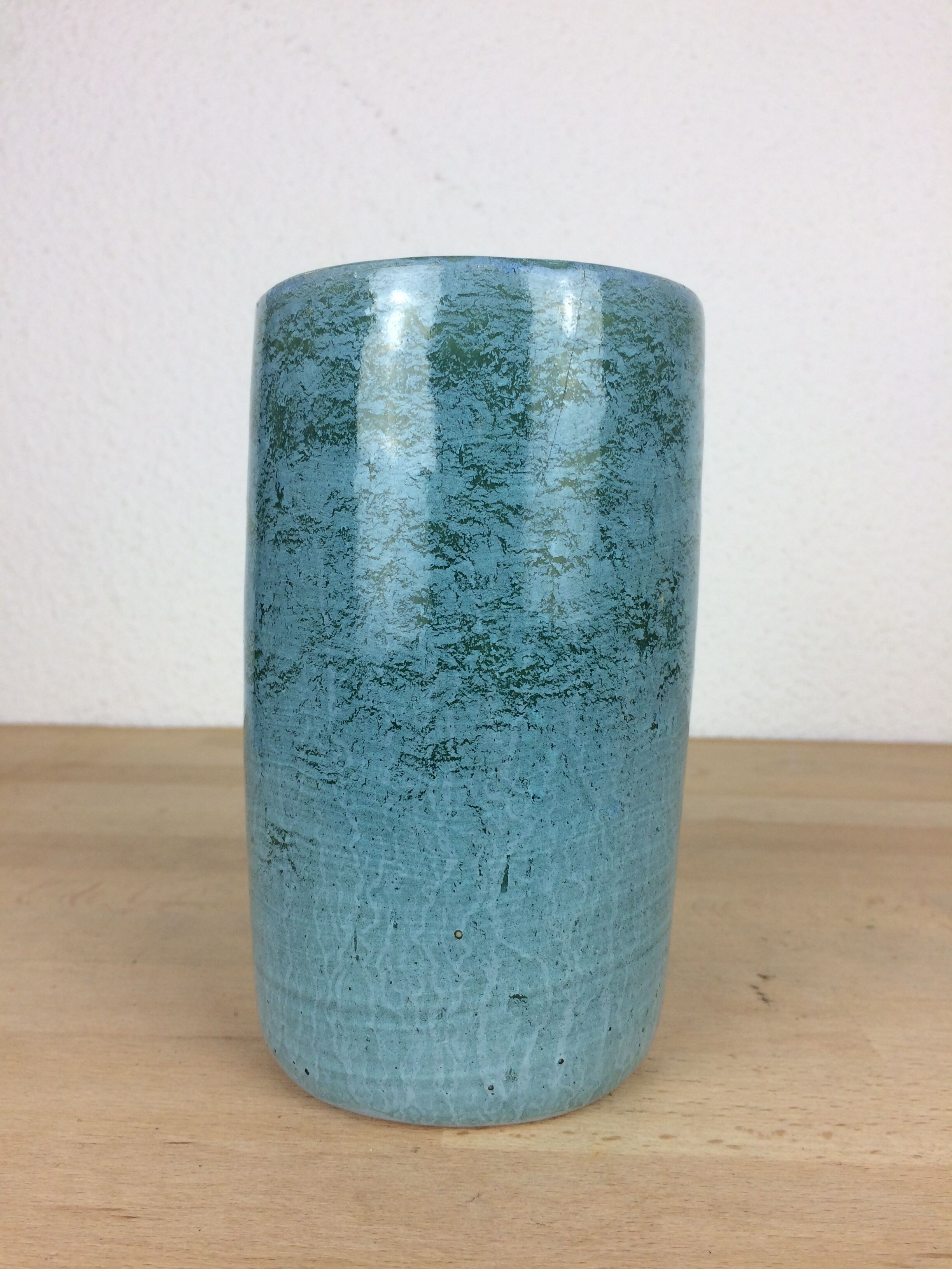 Blue ceramic roller vase