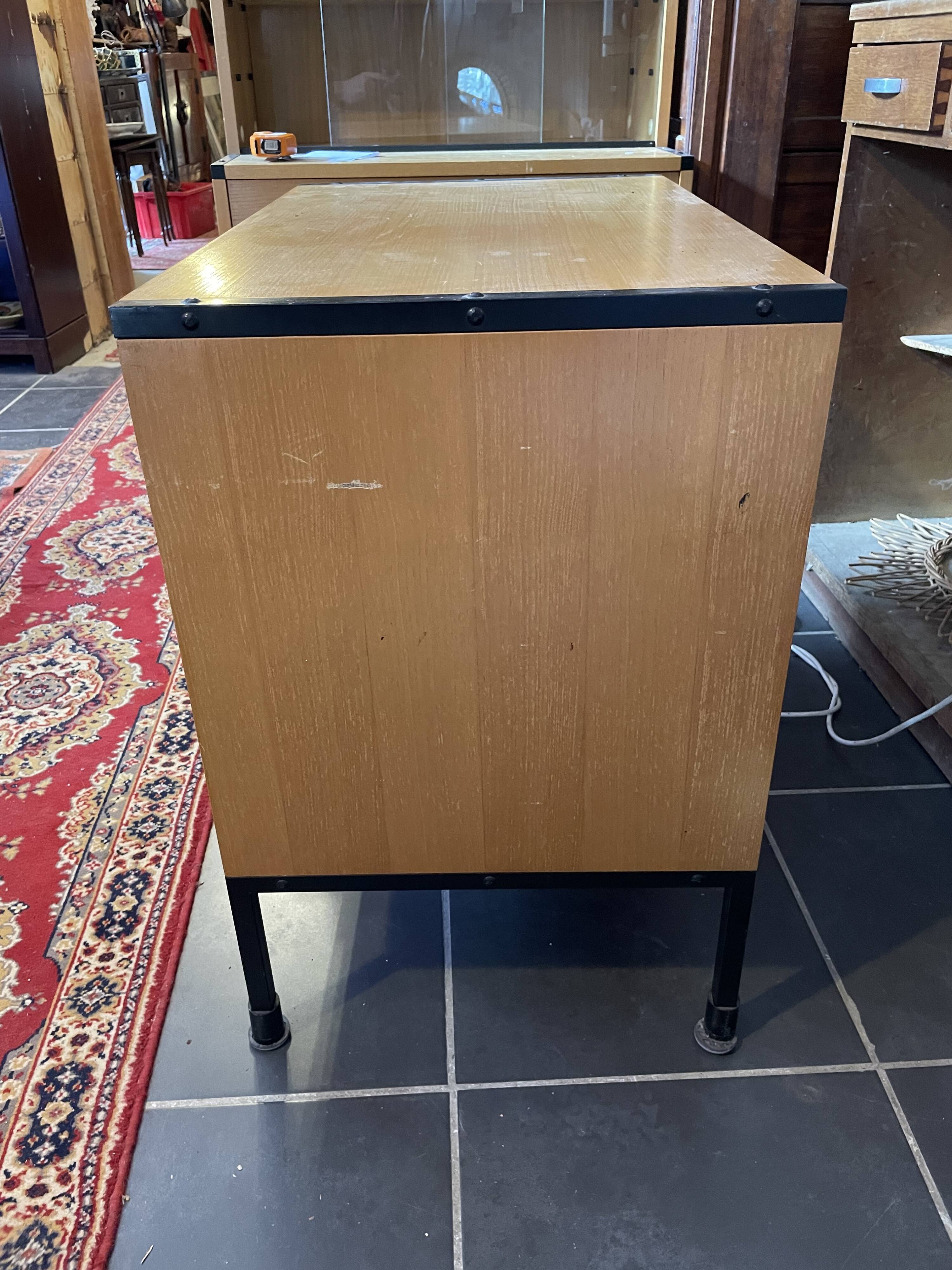 Storage furniture in ash and lacquered metal