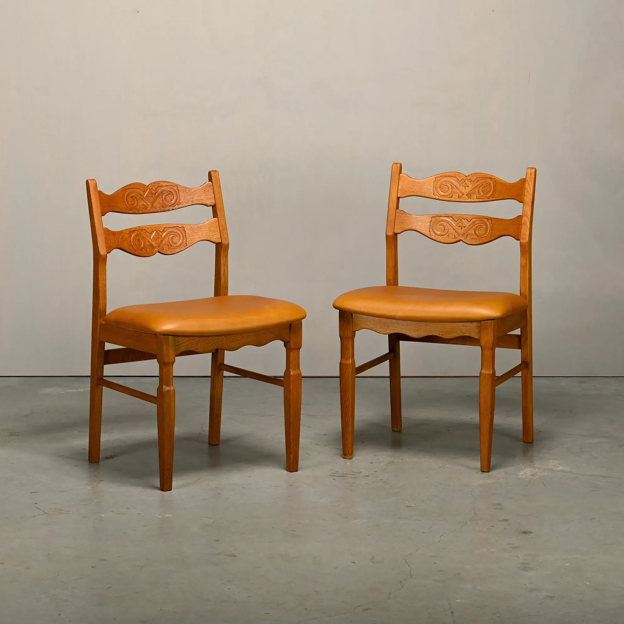 Razorblade style dining chairs by Henning Kjærnulf Oak and Leather Denmark