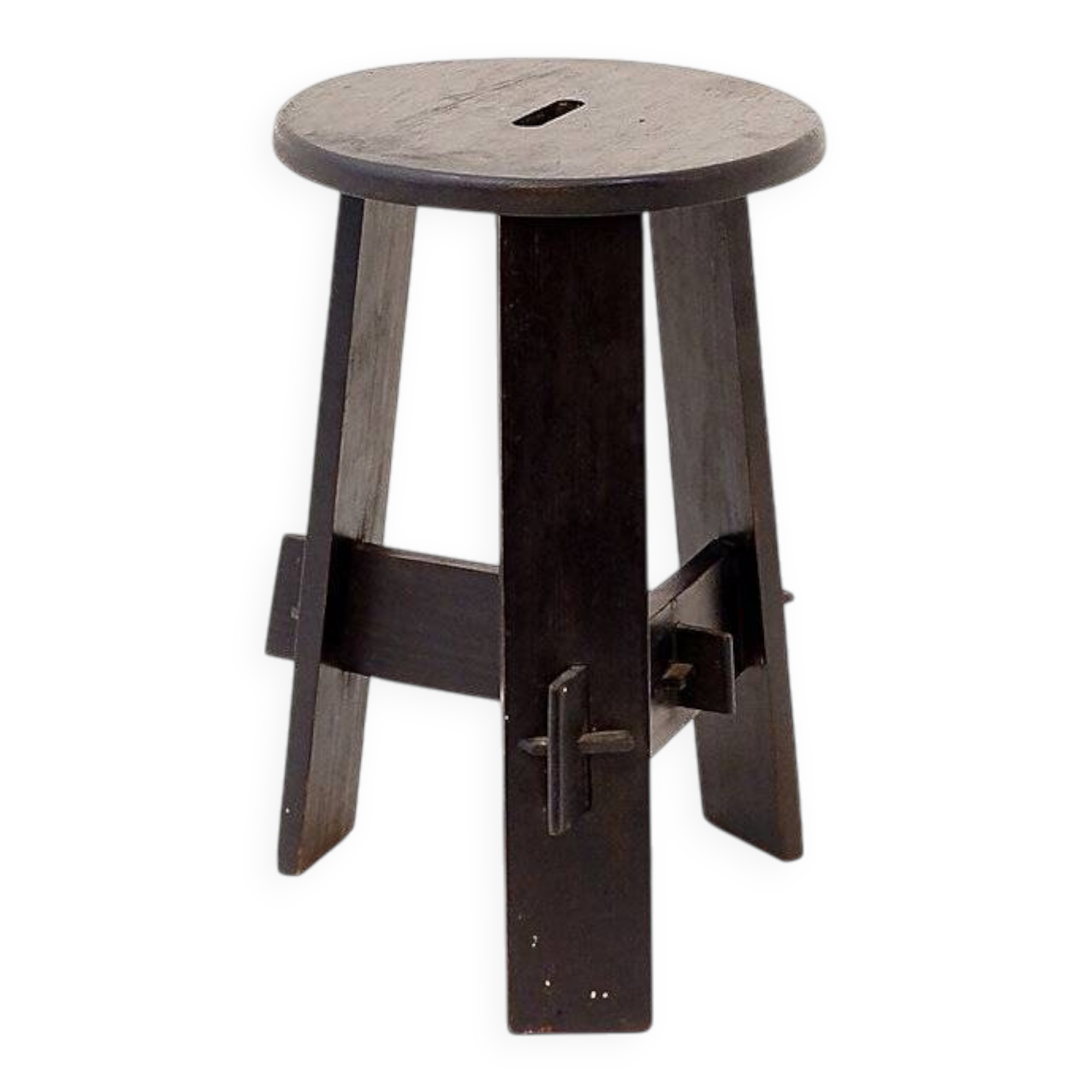 Vintage black-stained wooden tripod stool with mortise joints.