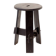 Vintage black-stained wooden tripod stool with mortise joints.