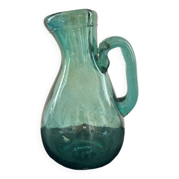 Bluish blown glass carafe