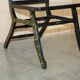 Pair of military folding chairs with Indian decoration.