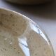 7 speckled stoneware plates