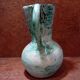 Turquoise ceramic pitcher vase