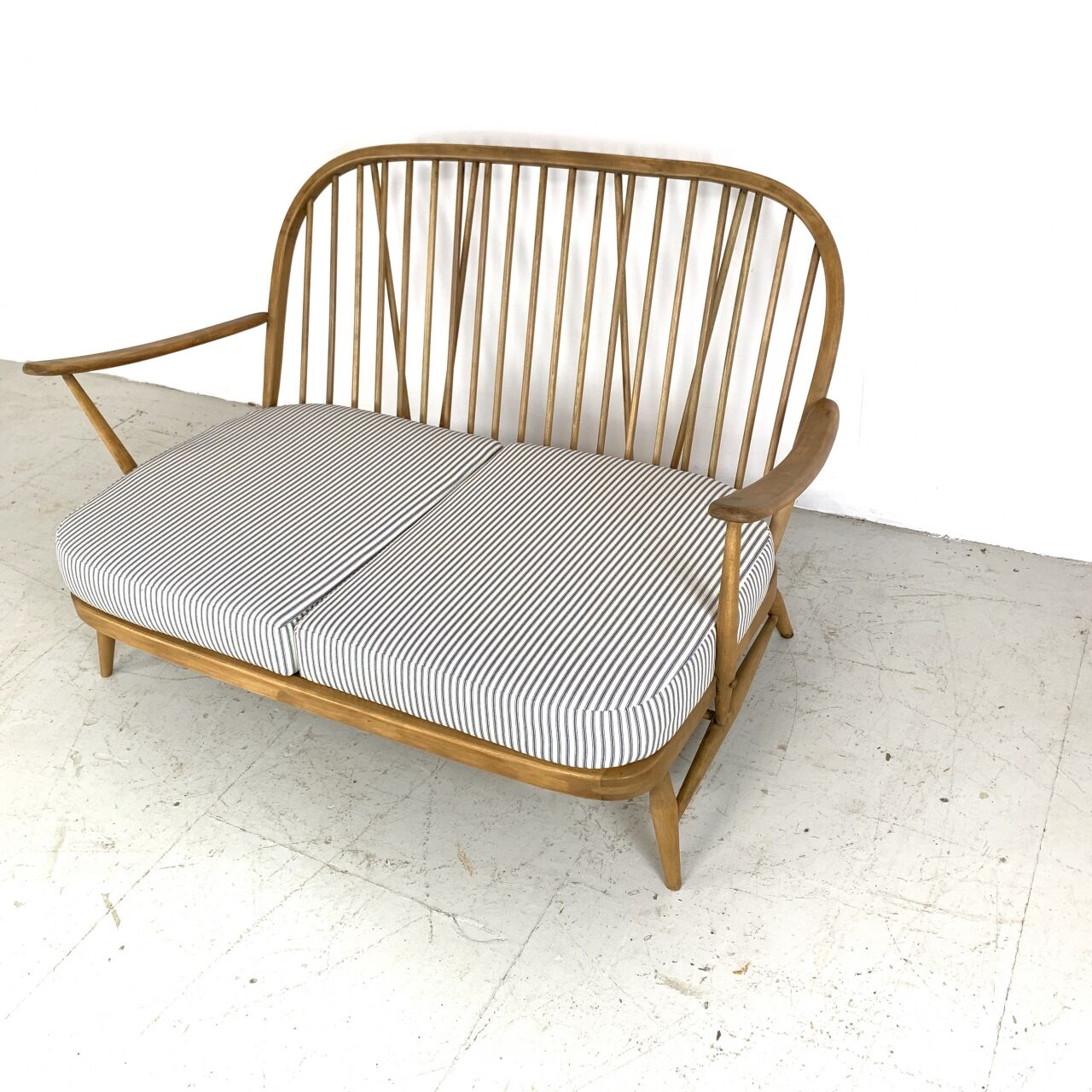 Vintage ercol windsor 2-seater sofa padded in French tick